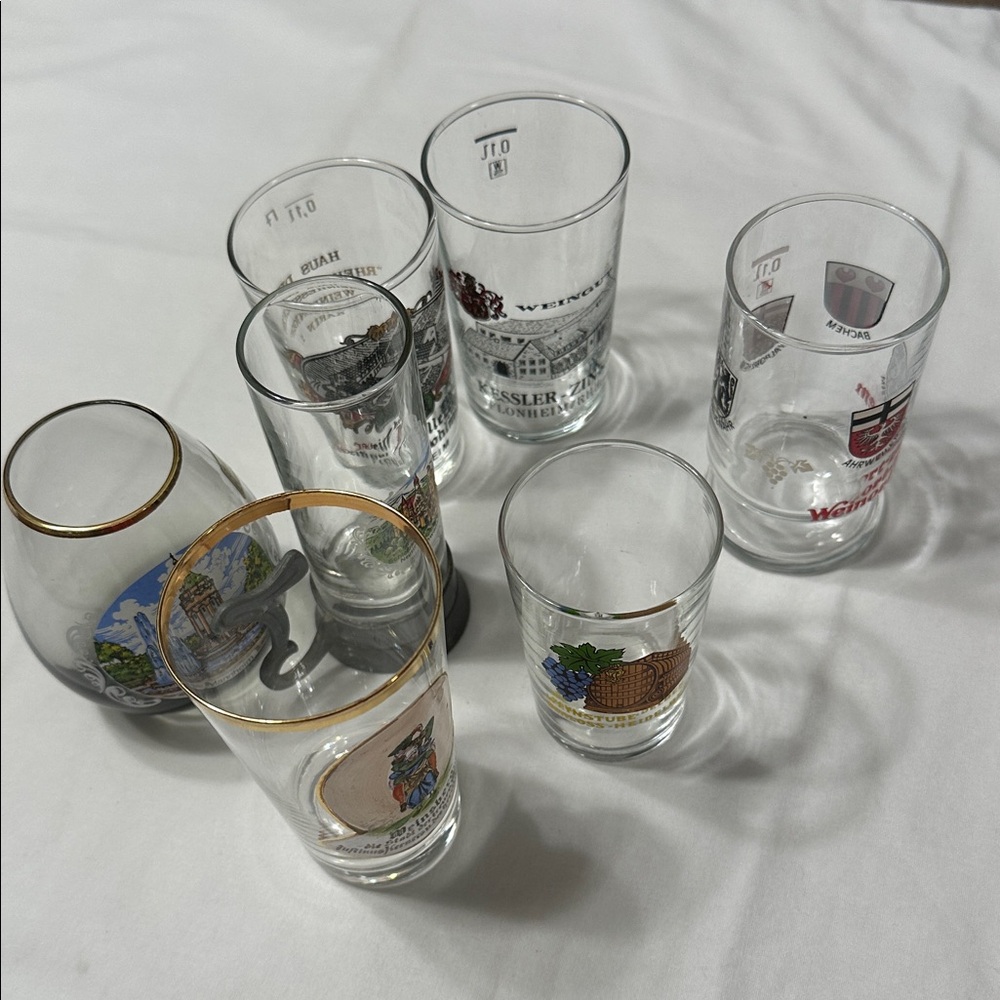 shot glass Set of 7 different sizes pre owned good condition